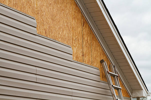 Professional Siding Installation technician working in Sandusky, OH